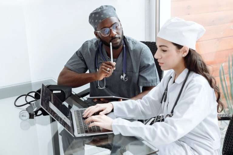 Free Medical Professionals in Their Scrub Suits Stock Photo